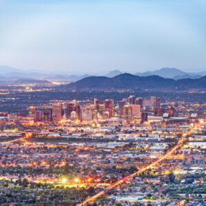 A realistic depiction of a lively street in Phoenix with local businesses and SEO elements.
